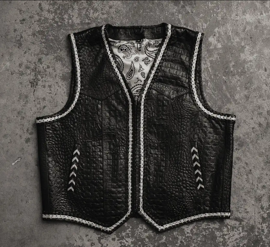 Men's black crocodile-embossed leather vest with white whipstitch trim and paisley lining