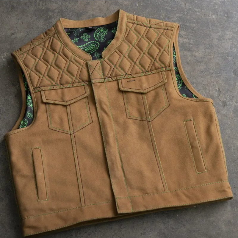Men's tan canvas motorcycle vest with diamond-quilted yoke and green paisley lining