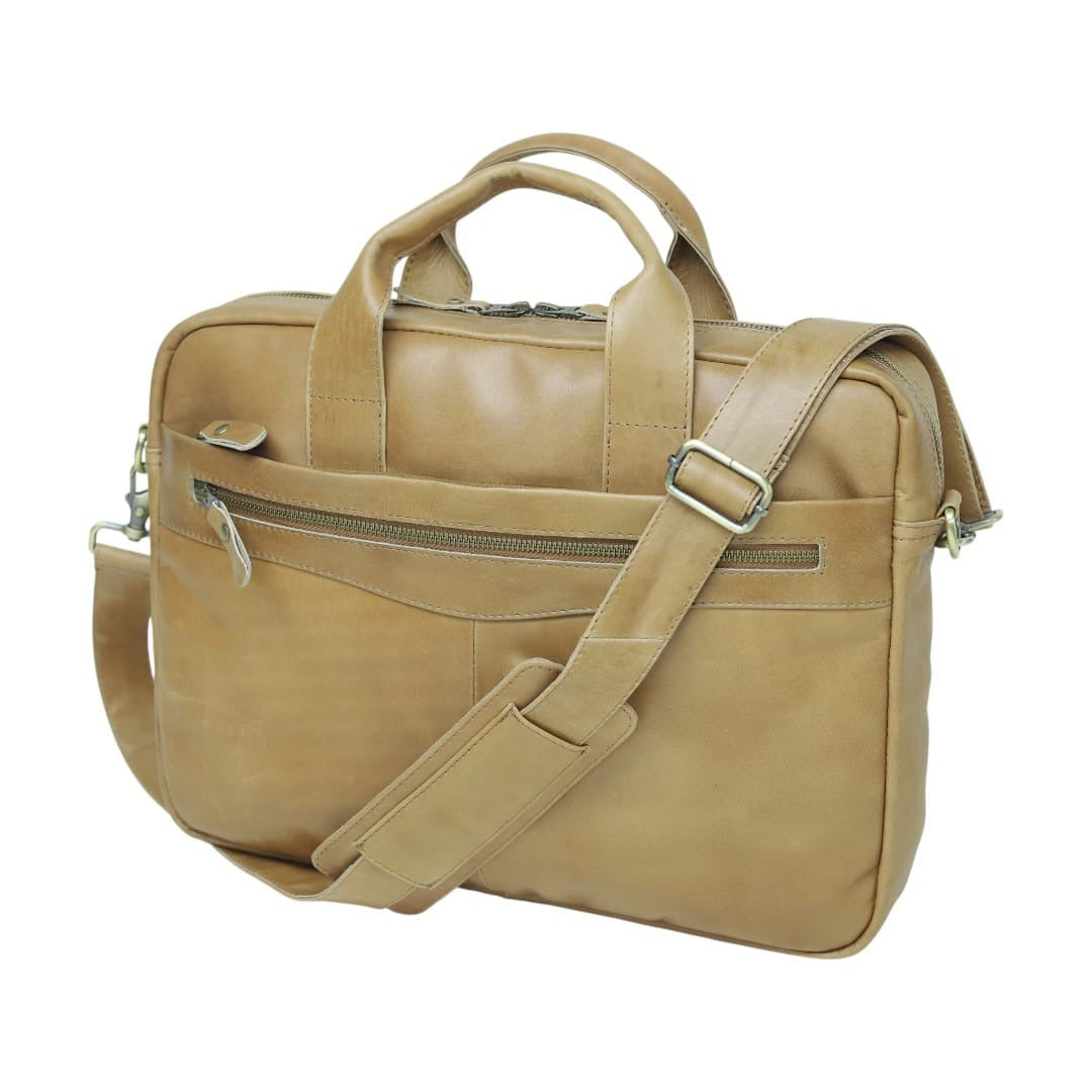 A tan leather briefcase with dual top handles, a front zippered pocket, and an adjustable shoulder strap, shown on a plain white background.