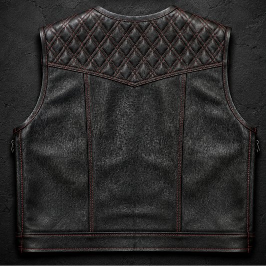 A black leather motorcycle vest with diamond-quilted stitching on the upper chest, shown flat against a dark textured background with a 'LEATHERS CRAFTED' logo above it.